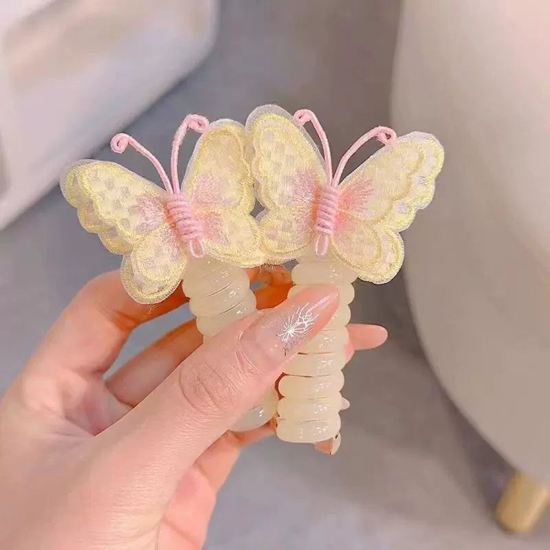 Butterfly Spiral Hair Tie ~ Turns boring ponytails into butterfly masterpieces.