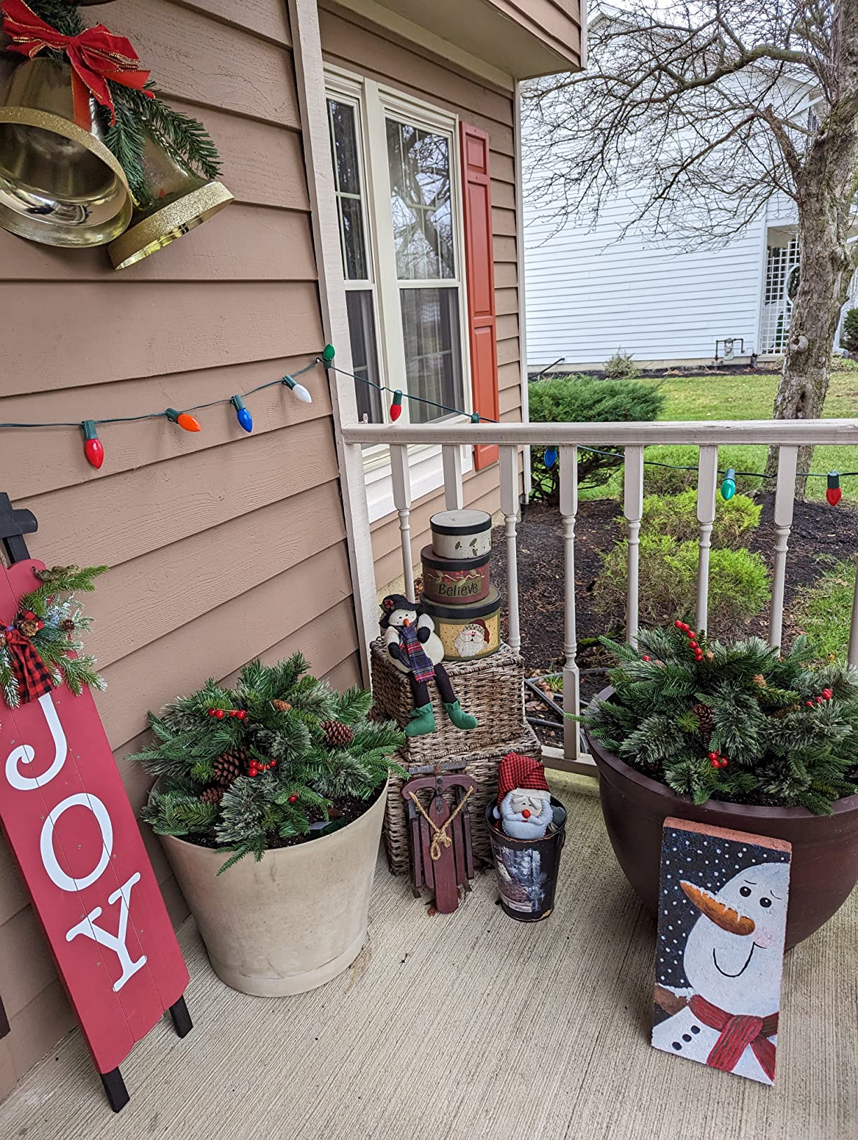 Mini Artificial Christmas Tree ~ Weatherproof sparkle for entryways and patios.