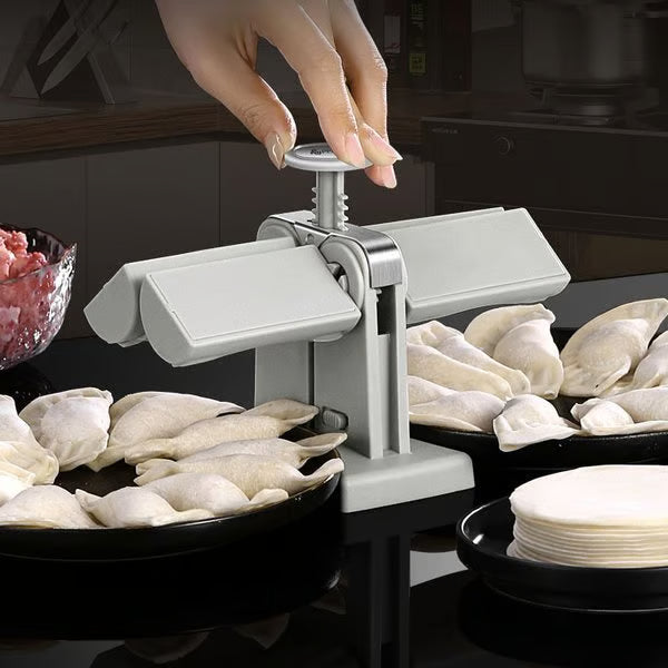 Double Head Dumpling Maker ~ Seal two perfect dumplings in one press.