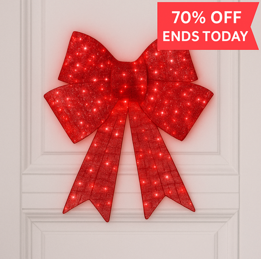 Lit Christmas Bow / Too bright, too bold, too beautiful to ignore.