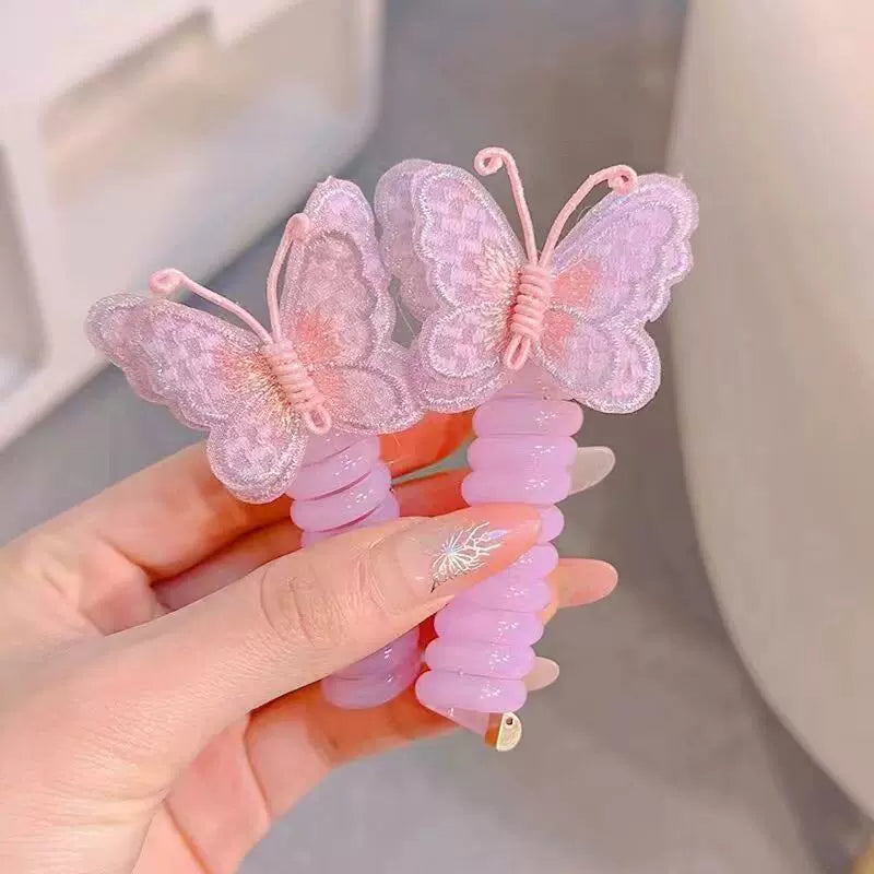 Butterfly Spiral Hair Tie ~ Turns boring ponytails into butterfly masterpieces.