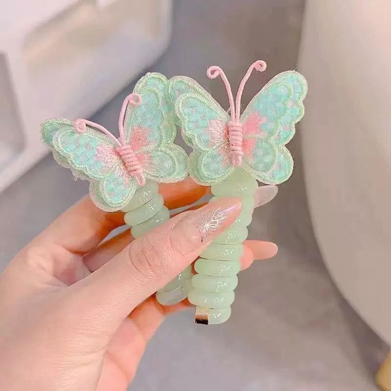 Butterfly Spiral Hair Tie ~ Turns boring ponytails into butterfly masterpieces.