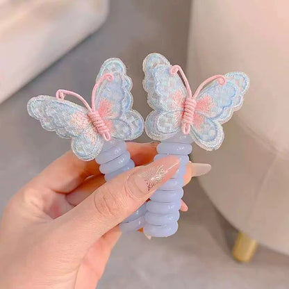 Butterfly Spiral Hair Tie ~ Turns boring ponytails into butterfly masterpieces.
