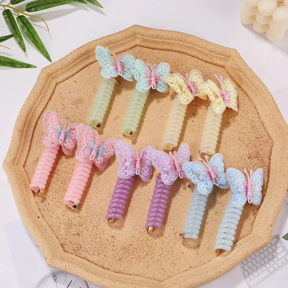 Butterfly Spiral Hair Tie ~ Turns boring ponytails into butterfly masterpieces.