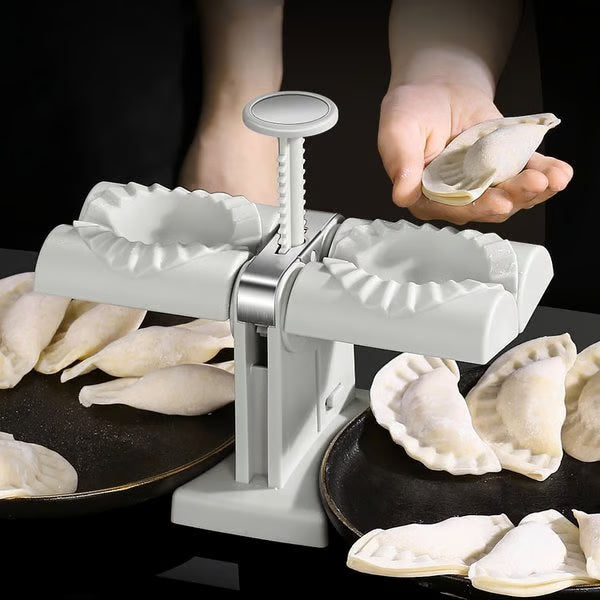 Double Head Dumpling Maker ~ Seal two perfect dumplings in one press.