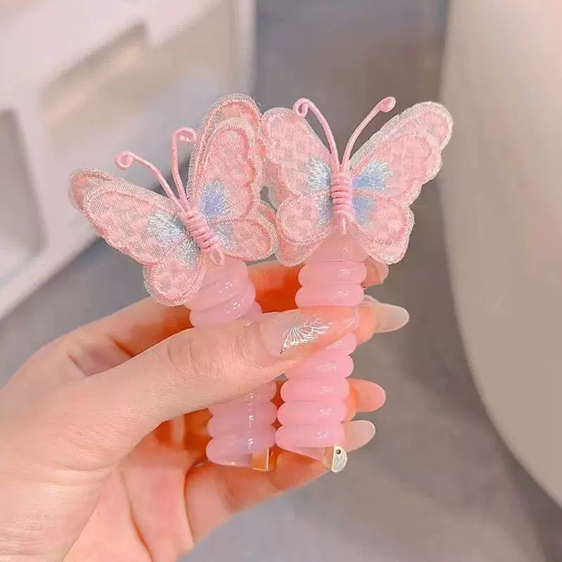 Butterfly Spiral Hair Tie ~ Turns boring ponytails into butterfly masterpieces.