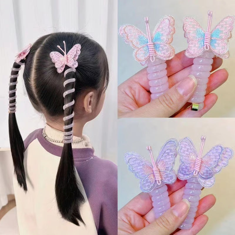 Butterfly Spiral Hair Tie ~ Turns boring ponytails into butterfly masterpieces.